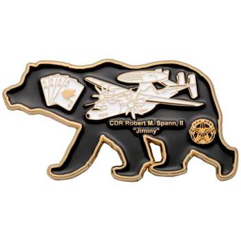 Bear shaped challenge coin featuring a white E-2 Hawkeye aircraft, four aces playing cards, and text for CDR Robert M. Spann, II "Jiminy" in gold on black enamel.