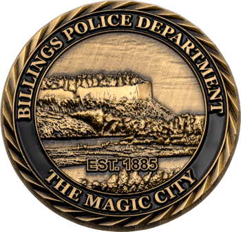 Antique brass challenge coin for Billings Police Department featuring a landscape of the Rimrocks and the text The Magic City.
