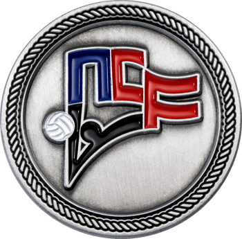 Antiqued silver challenge coin featuring a colorful NC1 monogram emblem and a volleyball detail within a rope border design.