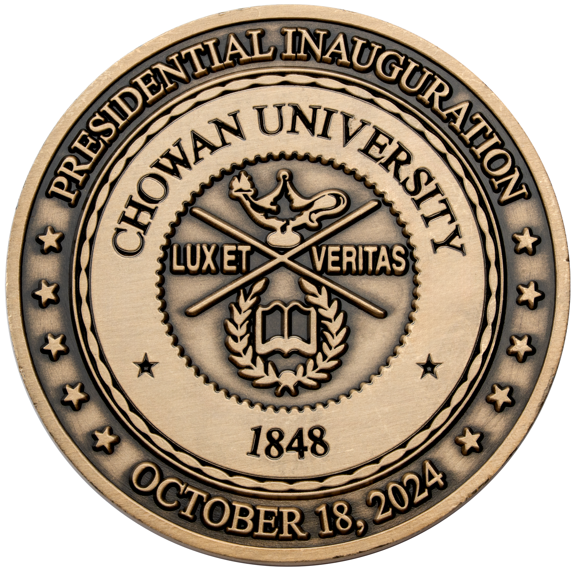 Antiqued bronze challenge coin for Chowan University Presidential Inauguration featuring the school seal, stars, and the date October 18, 2024.