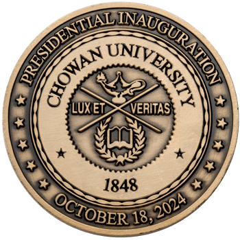 Antiqued bronze challenge coin for Chowan University Presidential Inauguration featuring the school seal, stars, and the date October 18, 2024.