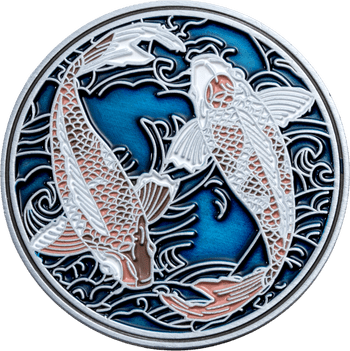 Challenge coin featuring two swimming koi fish in white and coral over a blue swirling water background with silver metal edges.