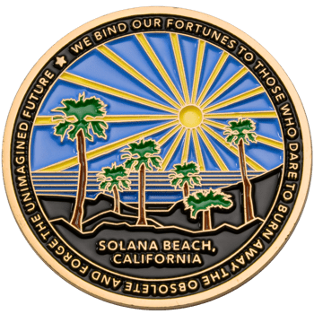 Gold challenge coin featuring Solana Beach, California with palm trees and a radiating sun over a blue and black landscape.