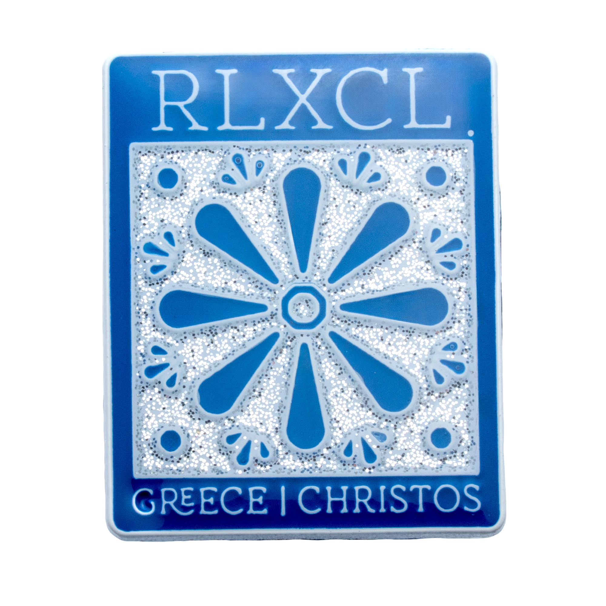Rectangular lapel pin with blue and silver glitter featuring RLXCL text, a floral tile design, and Greece Christos text.