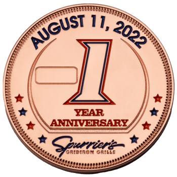 Copper challenge coin for Spurrier's Gridiron Grille 1 Year Anniversary, dated August 11, 2022, featuring a large number one and colored stars.