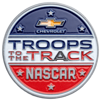 Circular challenge coin with Chevrolet, Troops to the Track, and NASCAR text in red, white, and blue with stars.