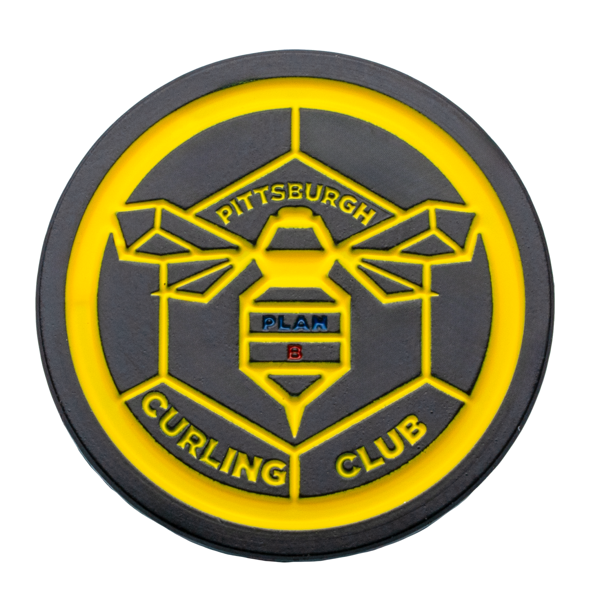 Circular black and yellow PVC challenge coin featuring the Pittsburgh Curling Club logo with a geometric bee design and the text Plan B.