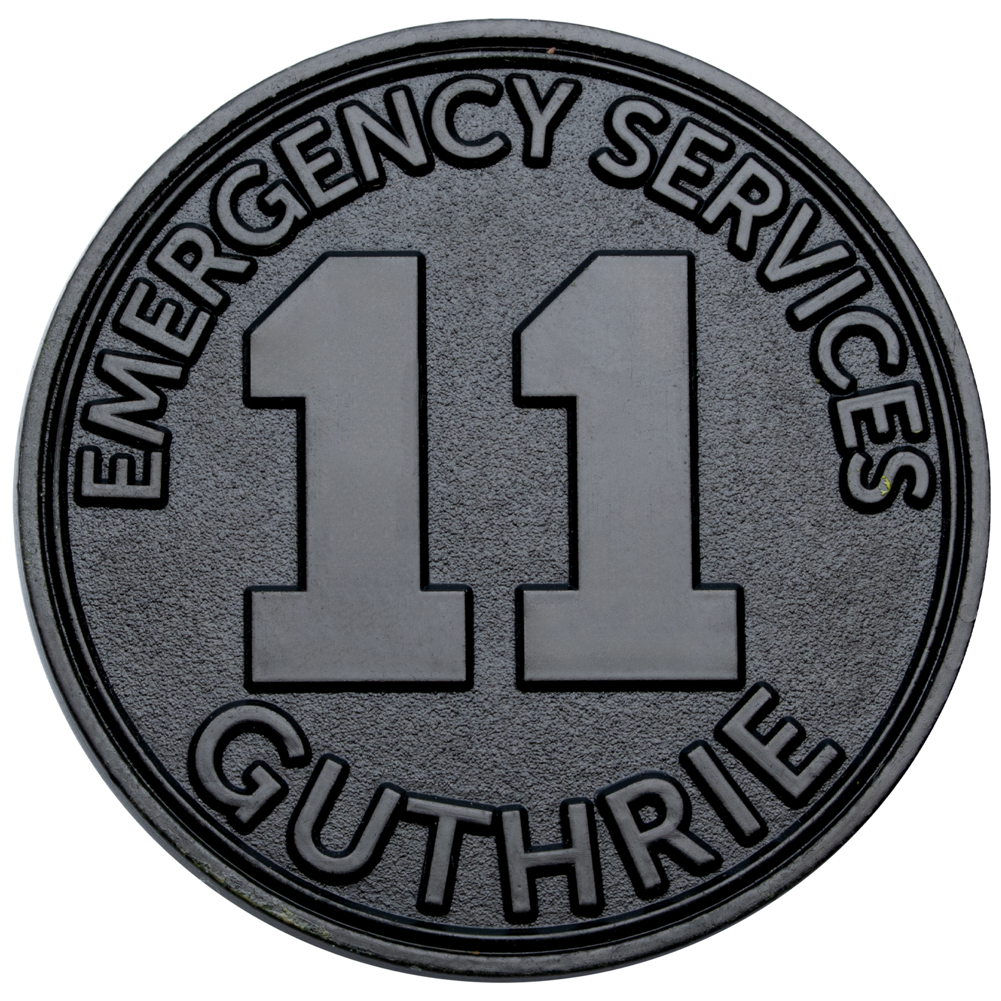 Circular black challenge coin featuring the number 11 with Emergency Services and Guthrie text in raised lettering.
