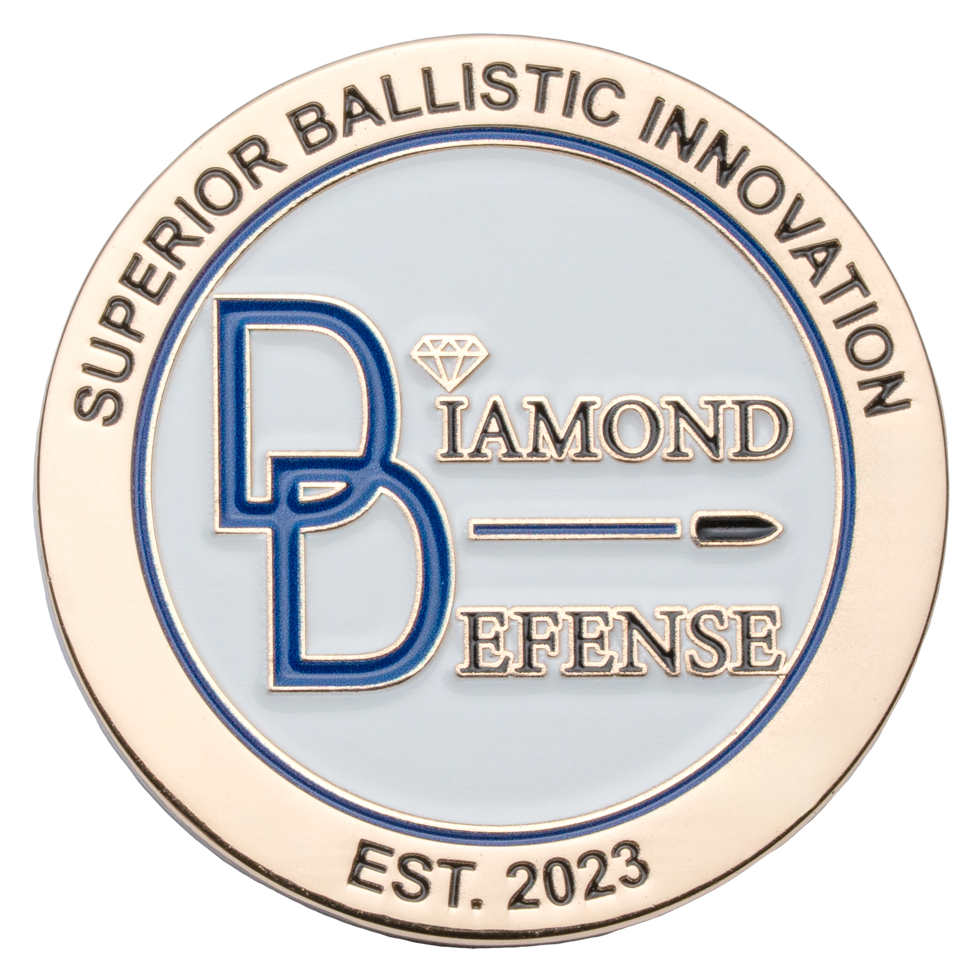 Gold and white challenge coin for Diamond Defense featuring a blue monogram, bullet icon, and the text Superior Ballistic Innovation.