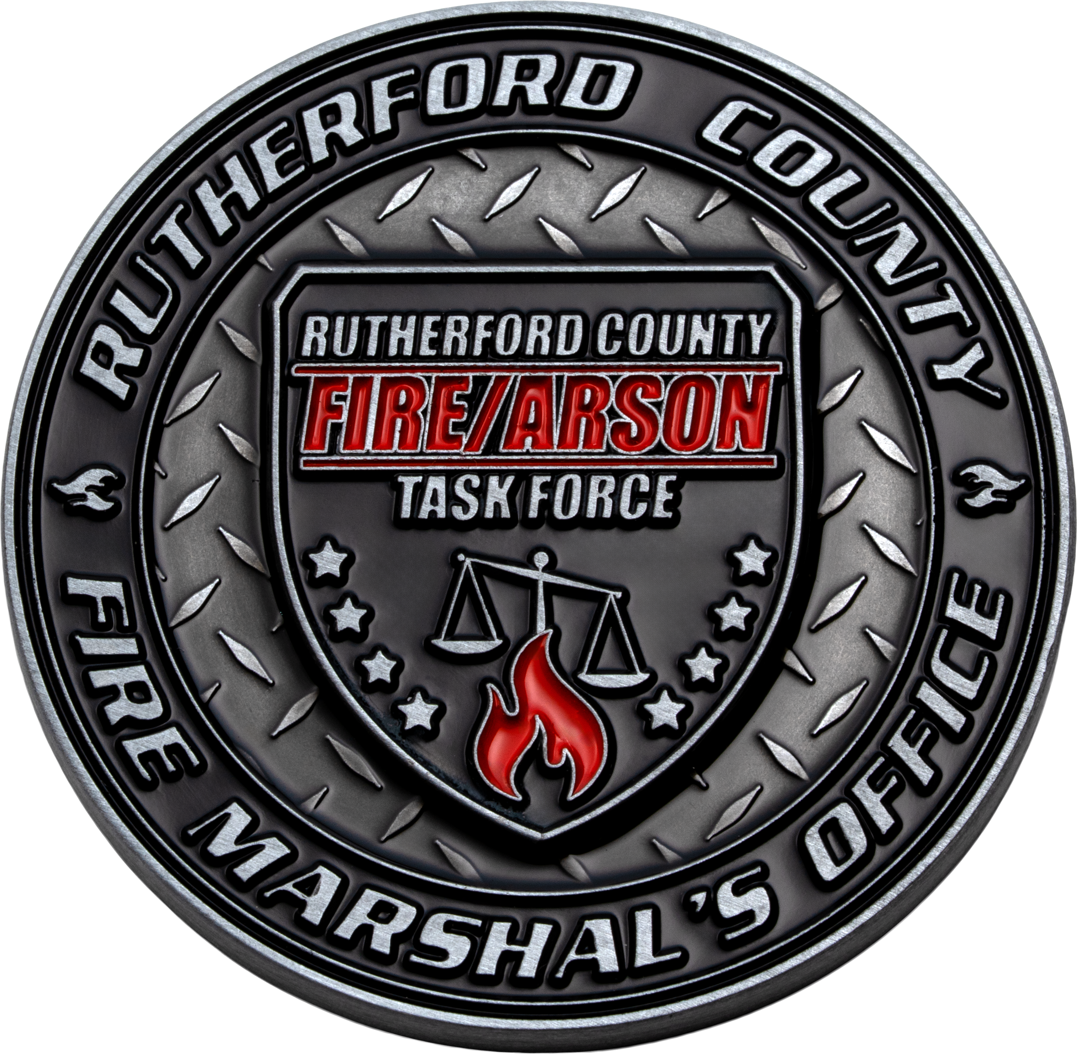 Circular challenge coin for the Rutherford County Fire/Arson Task Force featuring a diamond plate background, a central shield with scales of justice, and a red