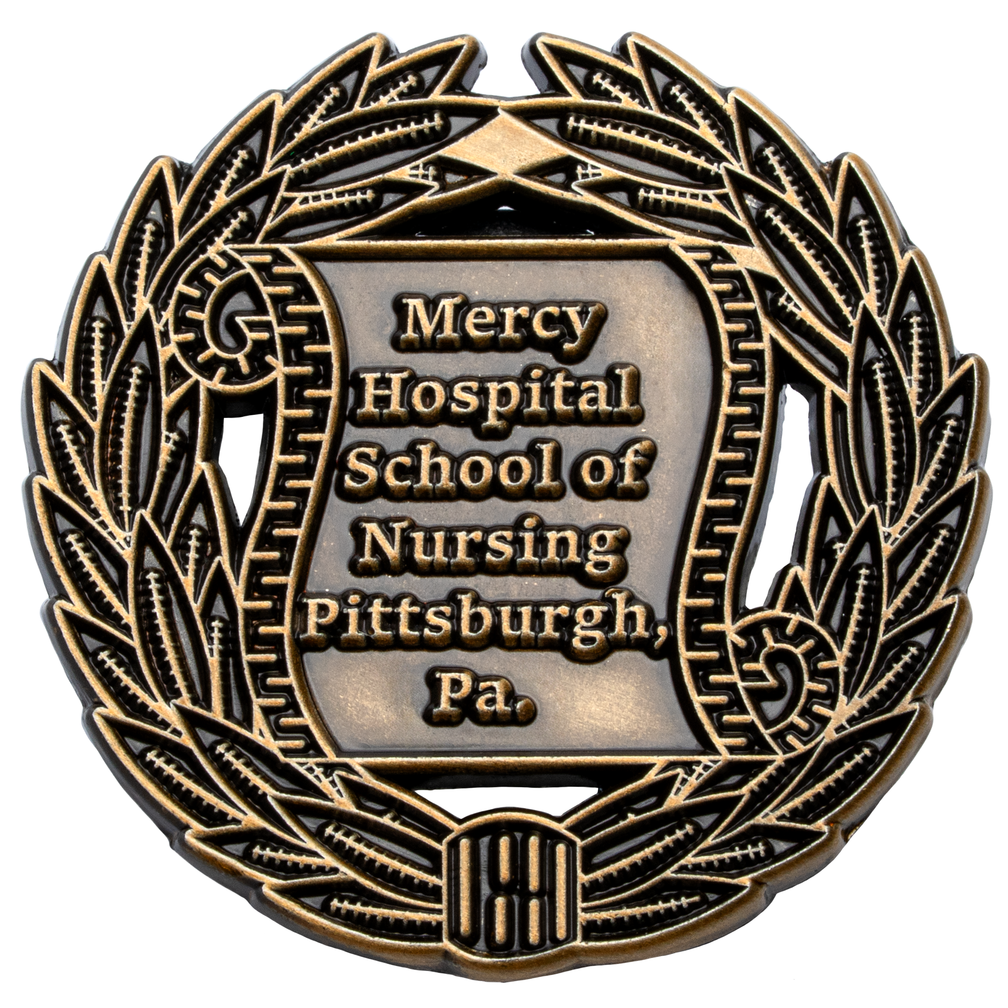 Antiqued gold lapel pin for Mercy Hospital School of Nursing Pittsburgh featuring a scroll and wreath design.