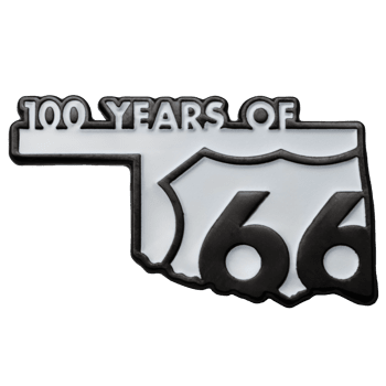 Enamel lapel pin featuring the shape of Oklahoma with the text 100 Years of 66 in white and black.