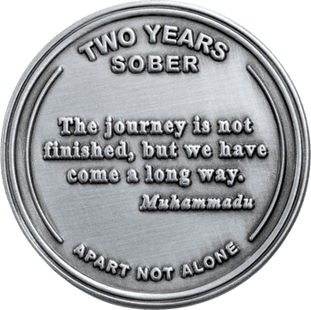 Antique silver sobriety challenge coin engraved with Two Years Sober and Apart Not Alone inspirational quote.