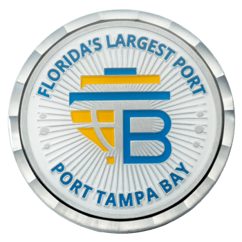 Circular silver coin featuring a blue and yellow Port Tampa Bay logo with text Florida's Largest Port on a white sunburst background.
