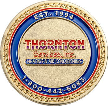 Thornton Services, Inc. Heating & Air Conditioning round custom gold challenge coin with rope border and blue and red enamel rings.