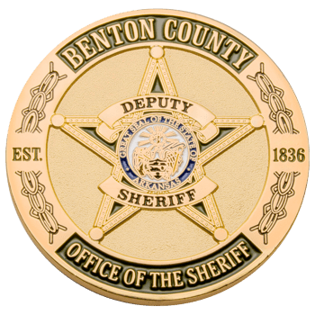 Gold challenge coin featuring a five-pointed star with the Benton County Deputy Sheriff seal and the Great Seal of Arkansas.