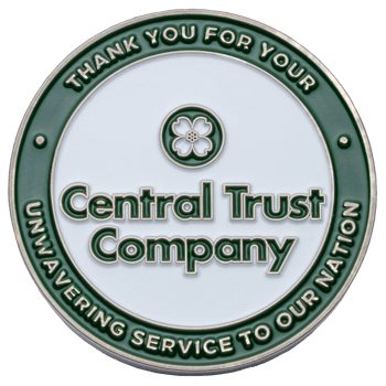 Round green and white Central Trust Company challenge coin featuring a dogwood flower emblem and a message of gratitude for service to the nation.