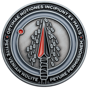 Silver challenge coin featuring a red and black spearhead surrounded by binary code and Latin text.