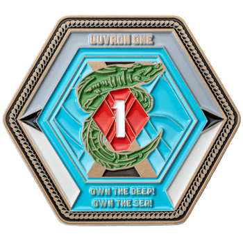 Hexagonal challenge coin for UUVRON ONE featuring a green eel wrapped around a red diamond with the number one, set against a blue background.